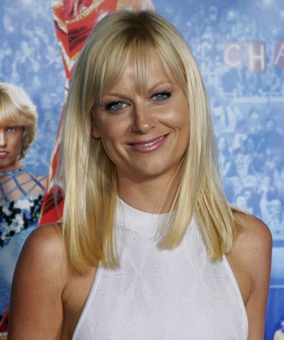 Amy Poehler with a long blunt cut hairstyle giving her a 