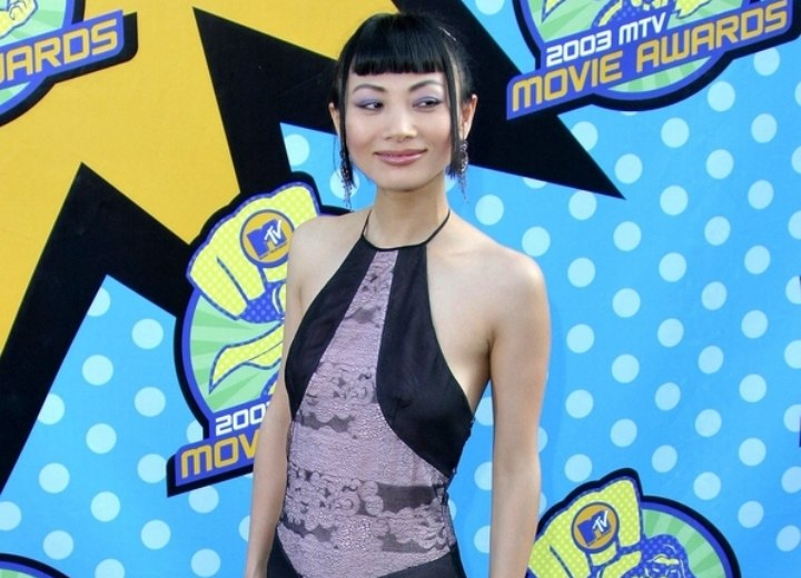 Bai Ling wearing an extravagant dress and hairstyle