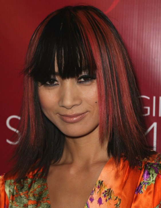 Bai Ling's hair open in a long black bob with pink streaks