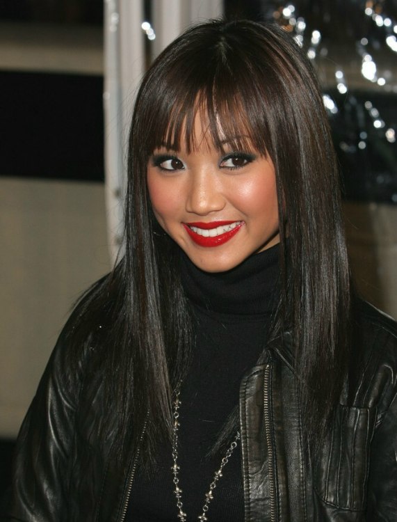 Brenda Song looking natural with smooth black hair and 
