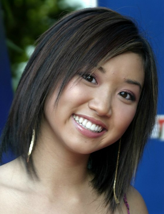 Brenda Song's Asian hair mid length and slithered by a 