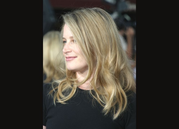 Side view of Bridget Fonda's long hairstyle