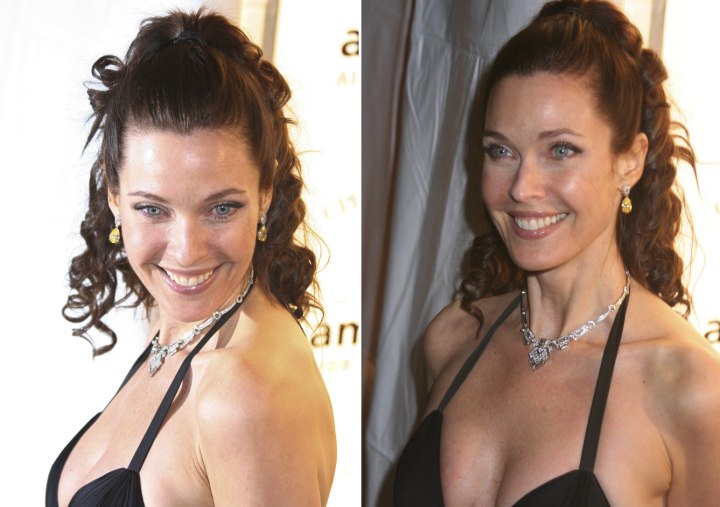 Carol Alt wearing her hair half up and half down