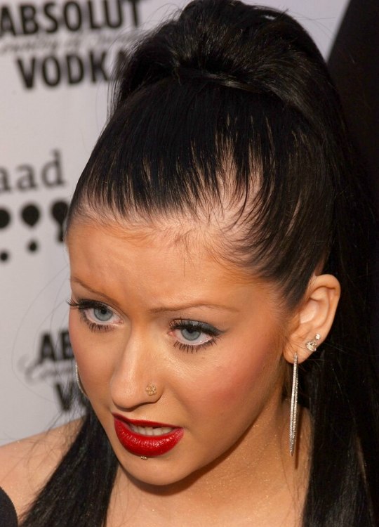 Christina Aguilera | Long black hair with extensions styled into a high