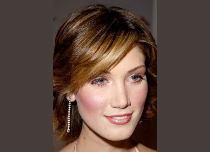 Delta Goodrem's dark blonde hair color