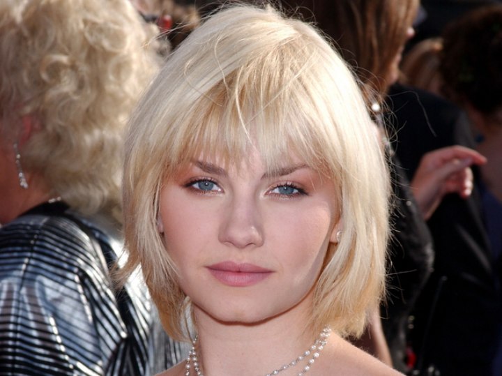 Elisha Cuthbert s Hairstyle That Covers The Neckline