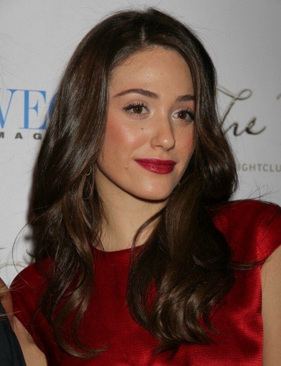 Emmy Rossum  Long brunette hairstyle with curls that 