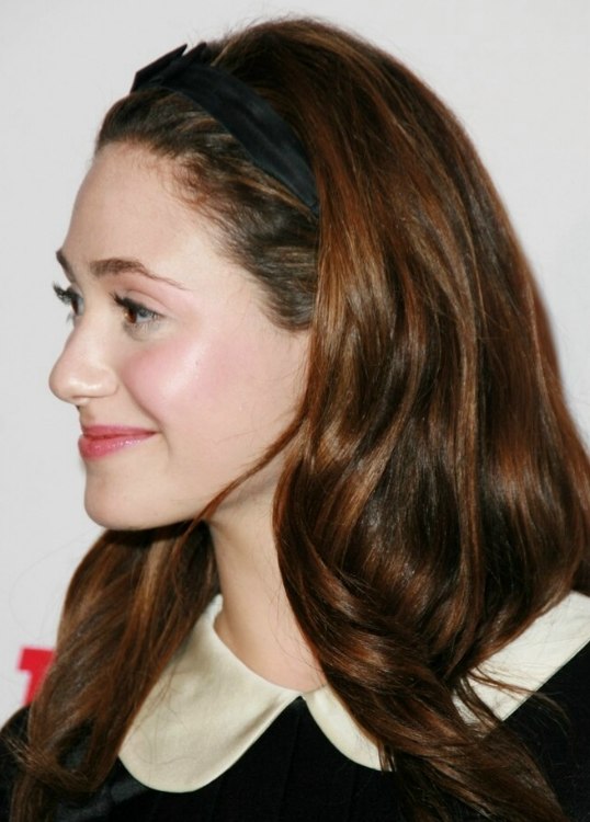 Emmy Rossum  Long hairstyle with the hair combed back and 