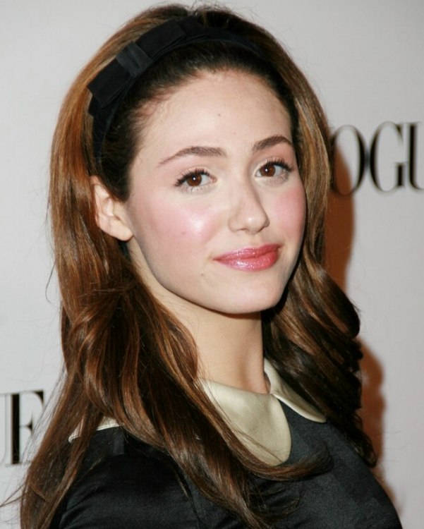 Emmy Rossum  Long hairstyle with the hair combed back and 