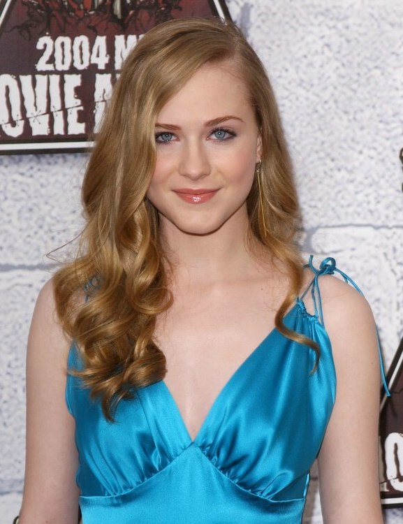 Evan Rachel Wood with her long hair styled into curls for 