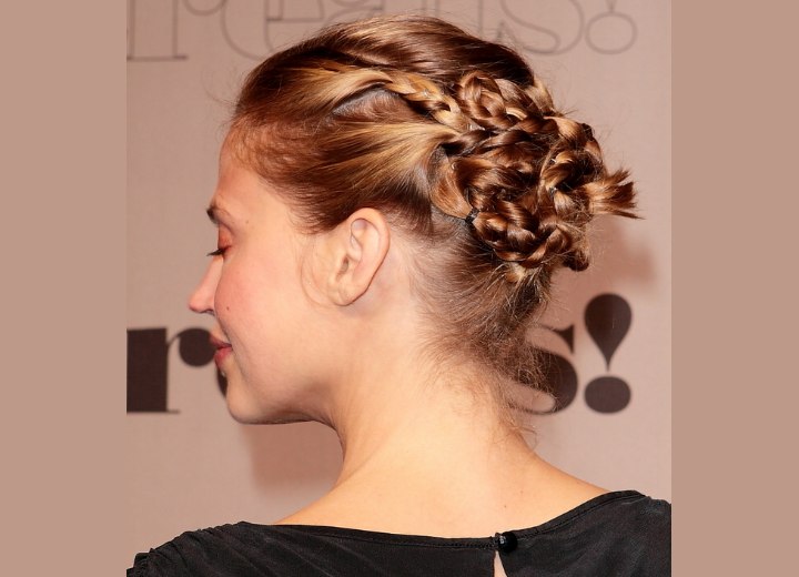 Estella Warren -  Simple to create braided updo