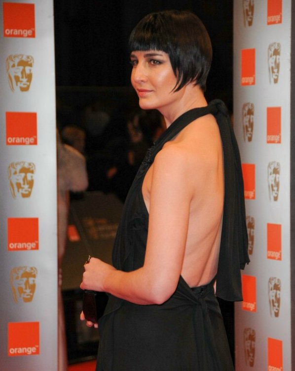 Erin O'Connor's with her hair in a traditional short bob 