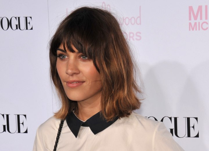 Alexa Chung wearing a fashionable collared blouse