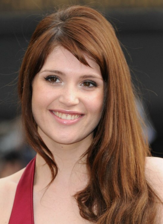 Gemma Arterton  Side swept long hair in an easy 