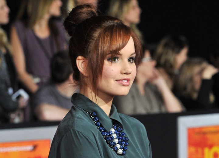 Debby Ryan wearing her hair up and away from her collar