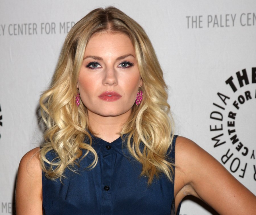 Elisha Cuthbert  Modern sleek hair with curled strands 