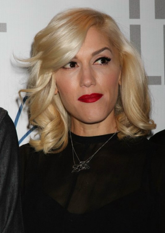 Gwen Stefani  Long hairstyle with a dip over one eye and 