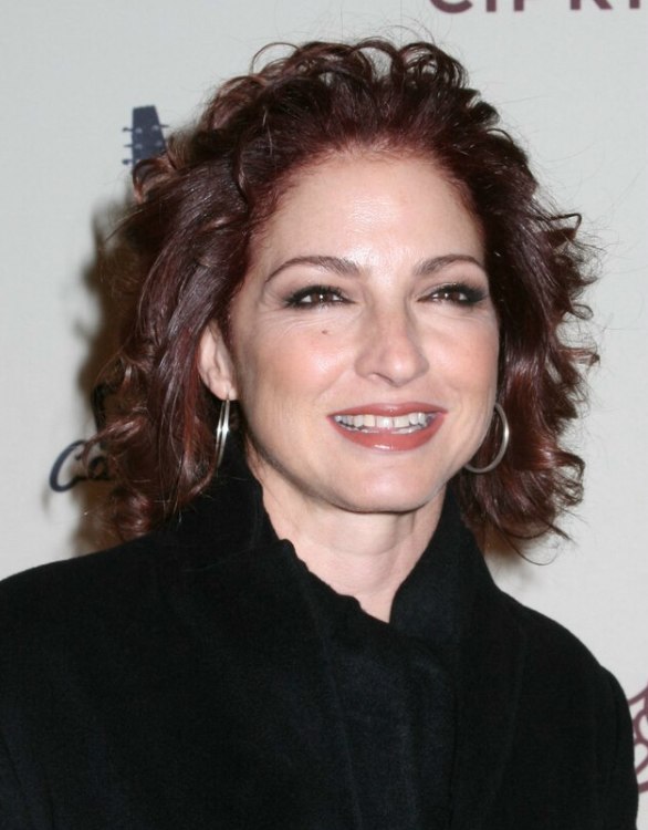 Gloria Estefan  Shoulder long hairstyle with curls and 