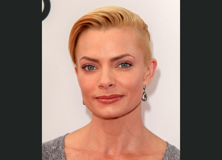 Jaime Pressly with very short buzzed hair