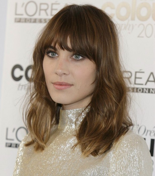 Alexa Chung | Long hair with a messy unkempt feel and at the eye bangs