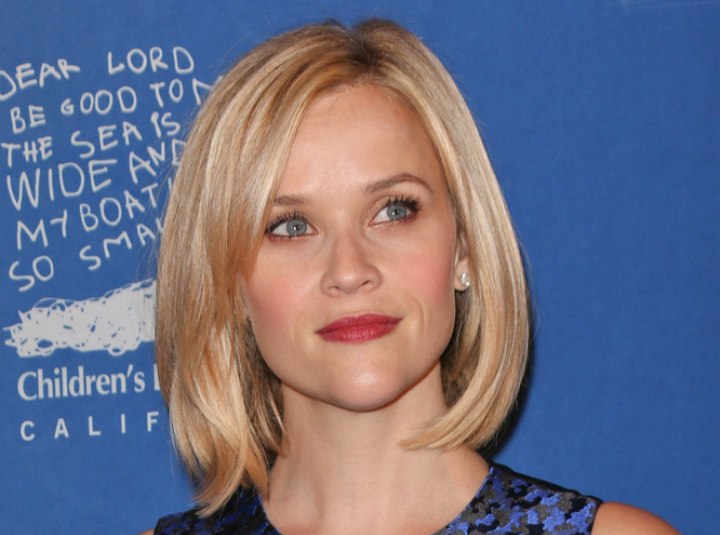 Reese Witherspoon | Blonde hair in a longer bob with side bangs