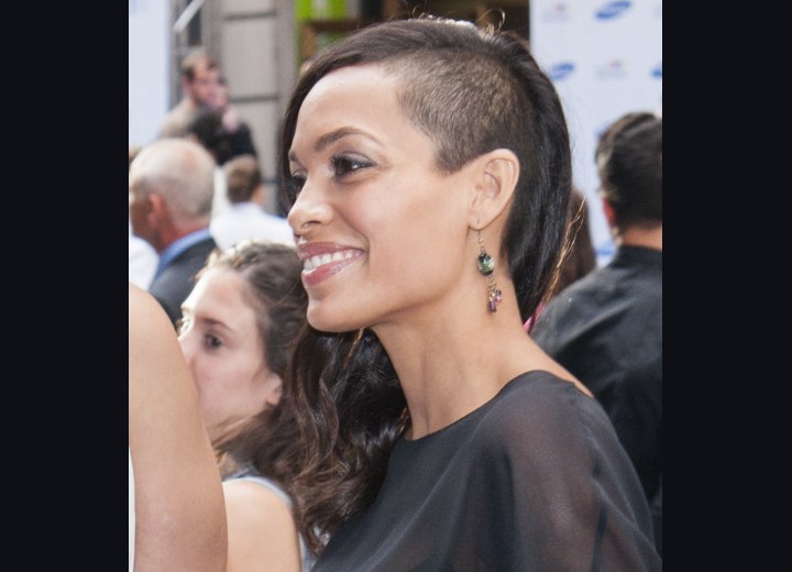 Rosario Dawson with half of her head shaved