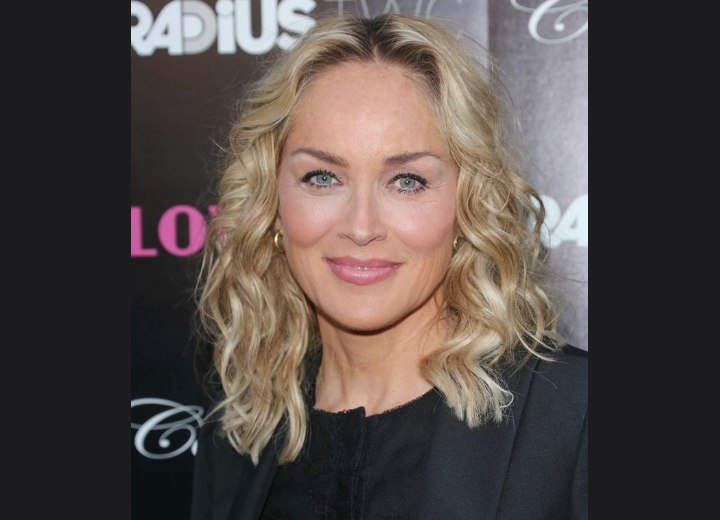 Sharon Stone's medium-length hairstyle for a youthful appearance