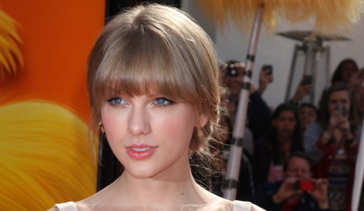 Taylor Swift  Hair in a low updo for formal occasions