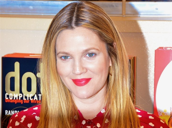 Drew Barrymore wearing necklaces under her shirt collar