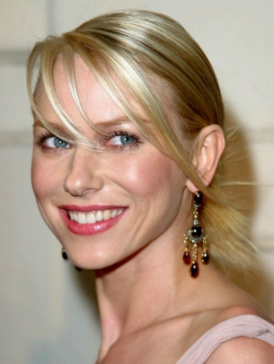 Naomi Watts with her hair rolled to a ballet style bun