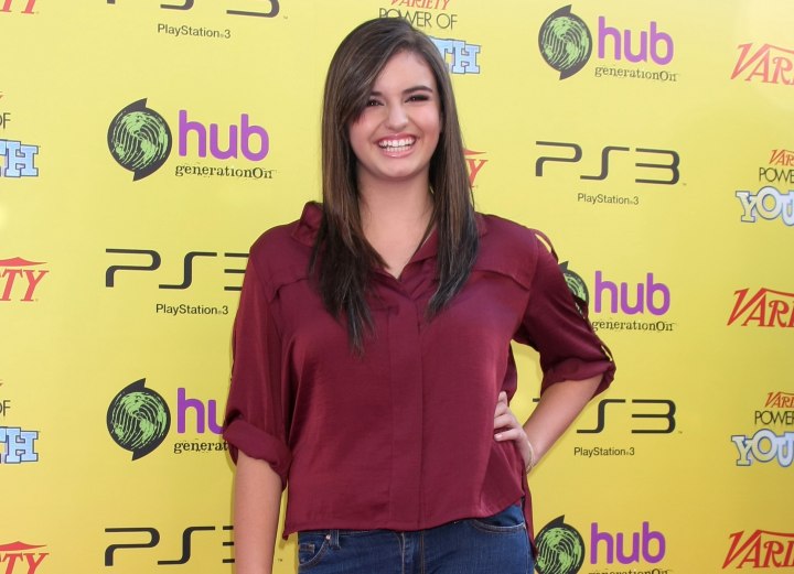 Rebecca Black look with boots and denim