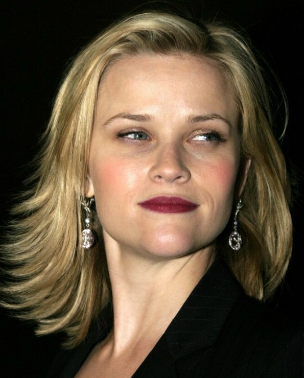 Reese Witherspoon sporting a choppy haircut with ends that 