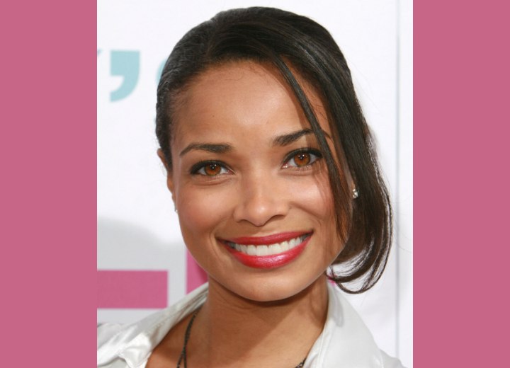 Rochelle Aytes wearing her hair pulled to one side