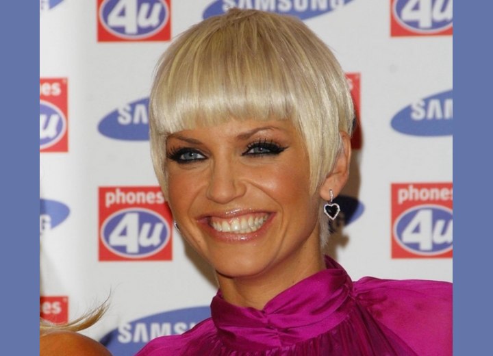 Sarah Harding with short platinum/silver hair