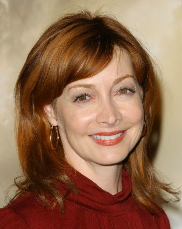 Sharon Lawrence  Medium long auburn hair with soft volume