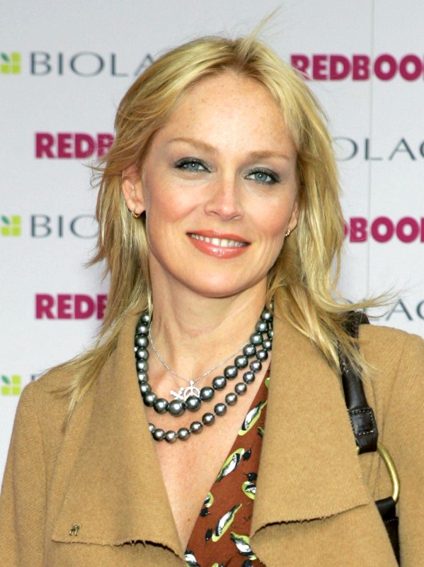Sharon Stone with very straight and razored long hair