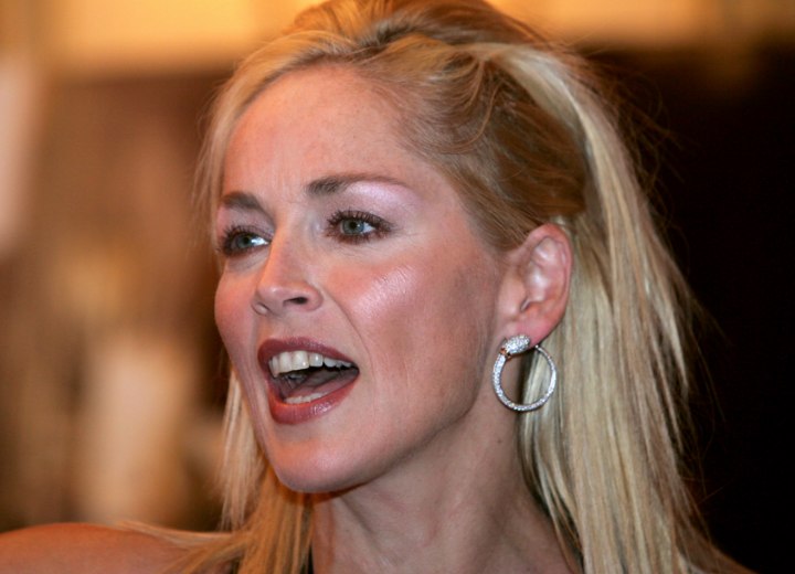 Side view of Sharon Stone's long chopped hair