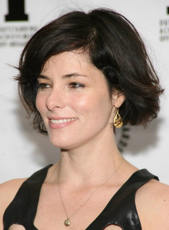 Parker Posey's short bob haircut with flipping out and waving