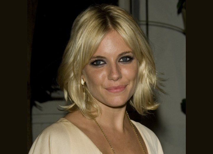 Sienna Miller - Layered mid length hair