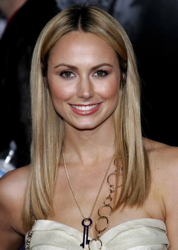 Stacy Keibler's long straight blonde hair styled with simplicity