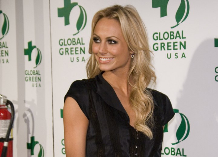 Stacy Keibler wearing her hair very long and wavy