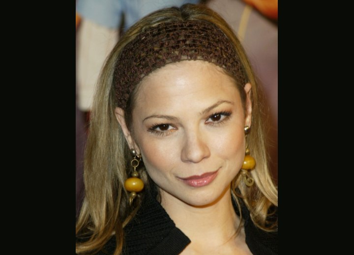 Tamara Braun wearing a head band in her hair