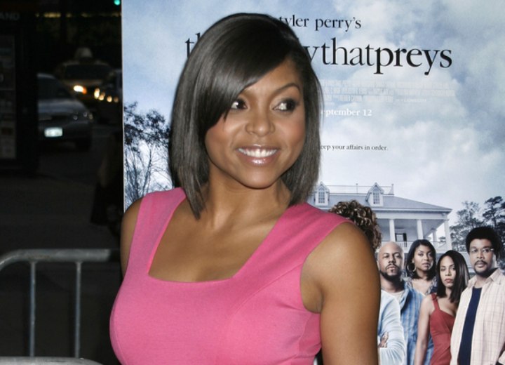 Taraja P Henson wearing a pink mini dress