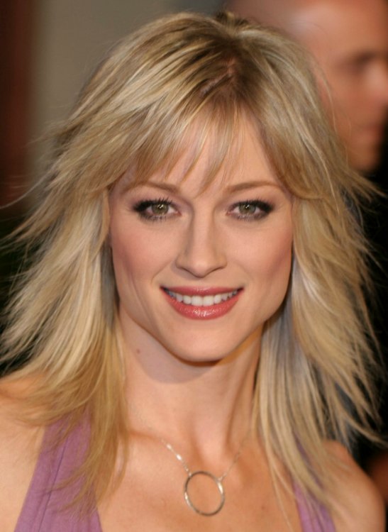 Teri Polo | Long straightened hair and long hair with jagged textured ends