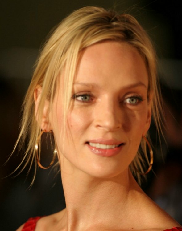 Uma Thurman Modern romantic up-style with a bun Uma Thurman Modern romantic up-style with a bun