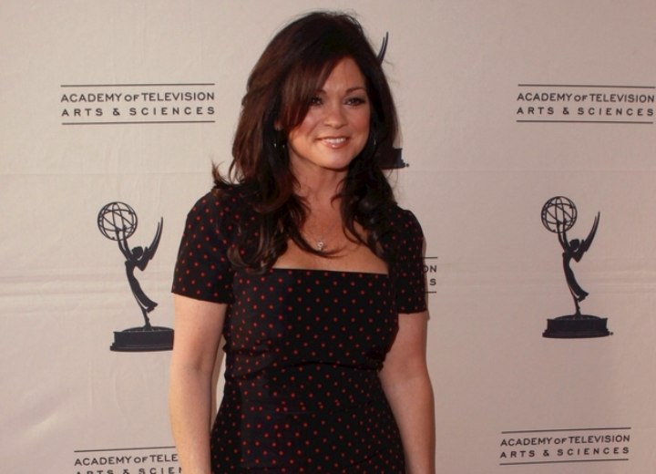 Valerie Bertinelli's look with long hair and wearing a dress