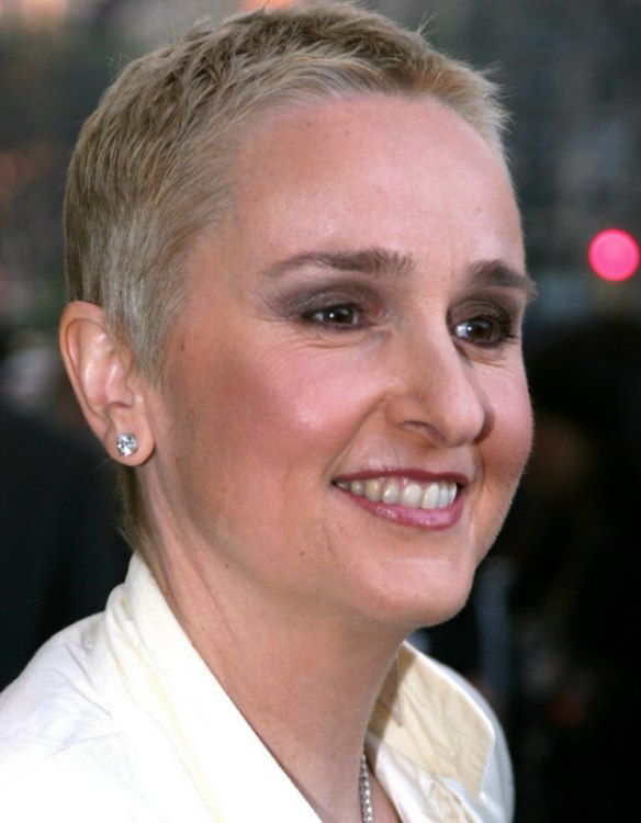Melissa Etheridge with a very short clippered hairstyle