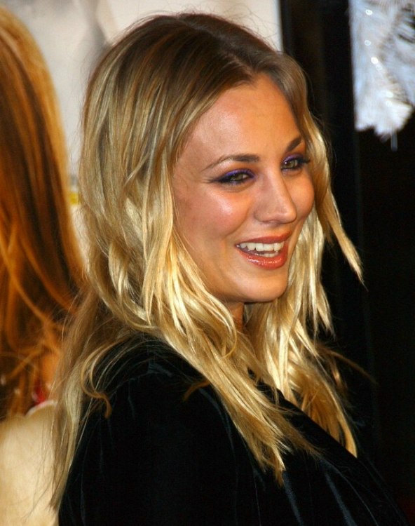 Kaley Cuoco wearing long and nearly straight hair styled 