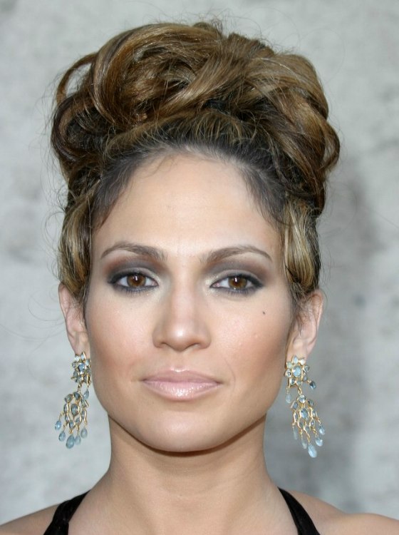 Jennifer Lopez with her hair in a high updo with curls
