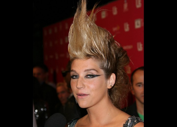 Kesha's rock star look with a Mohawk